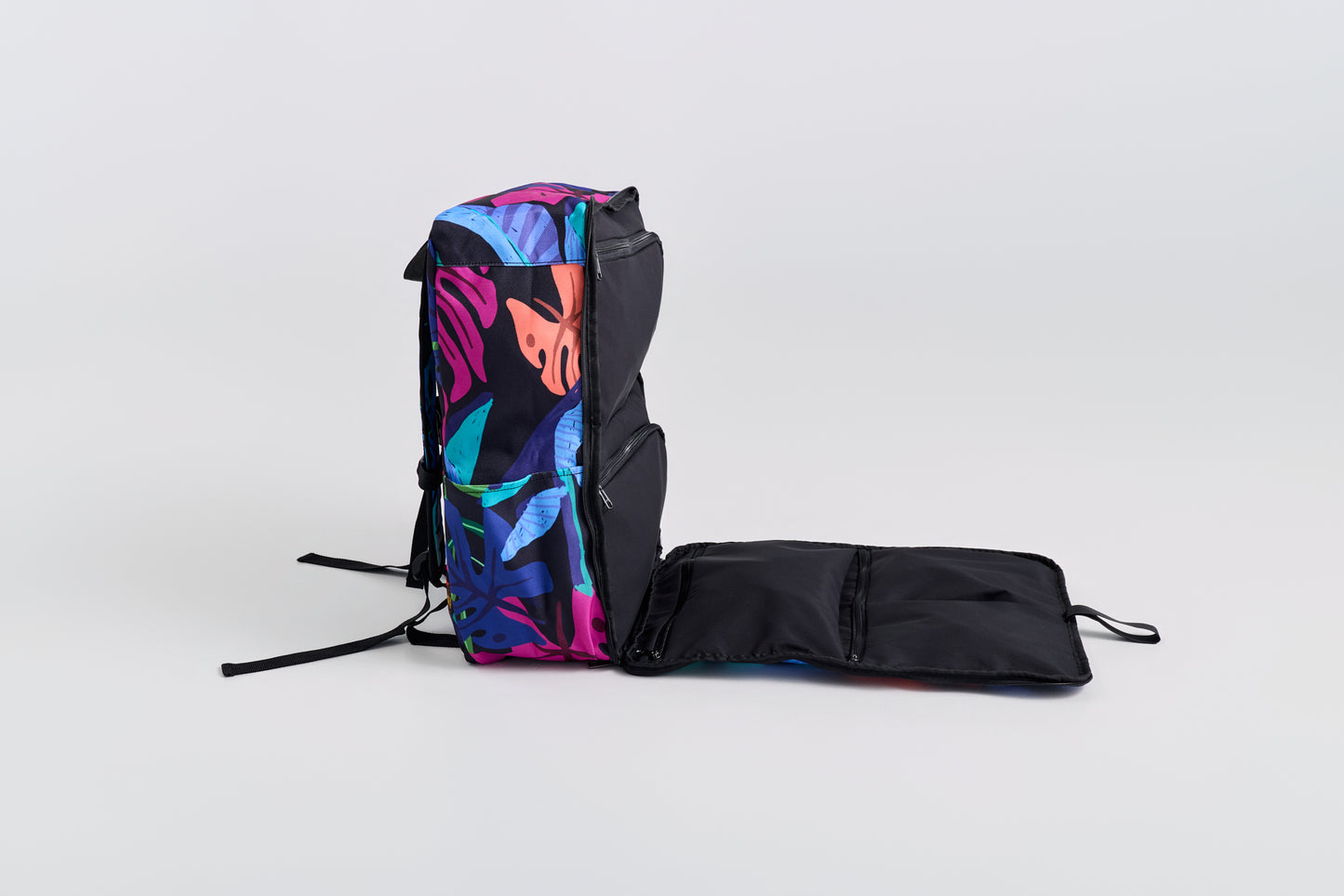 Multicolored backpack with floral design on a white background